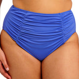 Blue high-waisted bikini bottom on a white background