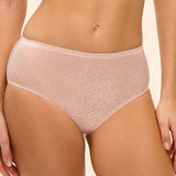 Beige high-waisted underwear worn by a person on a beige background