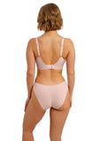 Woman wearing a pink bikini set on a white background