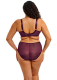 Person wearing a purple lingerie set on a white background