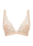 A nude coloured bralette with cream floral lace on white background