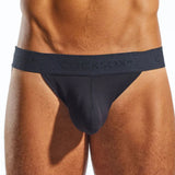 Man wearing a black men's underwear with brand logo on a white background