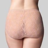 Beige lace lingerie on a plain background