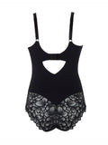 Black lace bodysuit with cut-out design on a white background
