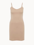 Beige slip dress on a white background