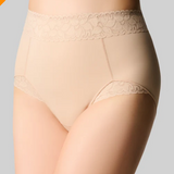 Beige lace-trimmed underwear on a gray background